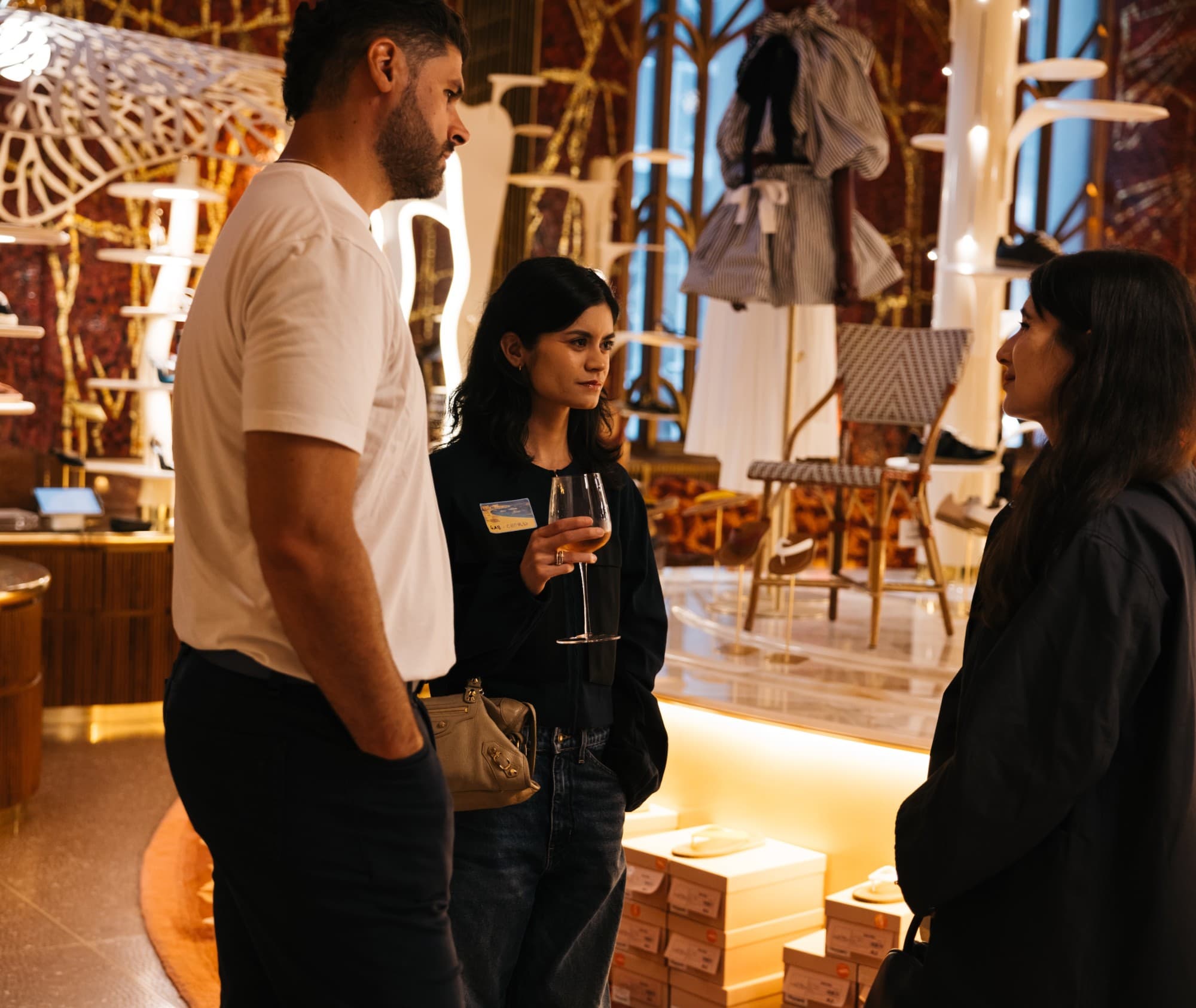 Guests connecting over wine at a Chord community event